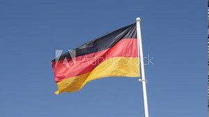 Flag of Germany waving in front of blue sky 4K 2160p 30fps UHD footage - Recognizable German national symbol on flag pole floating on wind 3840X2160 UltraHD video