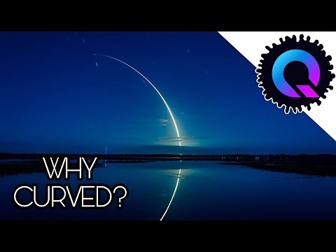 Why is a rocket trajectory curved after launch?