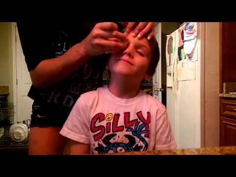 Marcello and mommy cleaning his stitches :)
