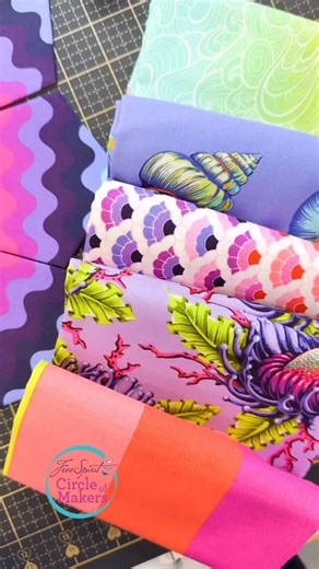 Pink Door Fabrics - Chelsea on Instagram: "✨ Work in Progress ✨ We’re deep into an EPP project using our favorite Floral Reef prints — the colors and motifs are making every stitch a joy! To keep things organized, we whipped up a Catch All Caddy outfitted with fun zippers and shiny nickel hardware. It’s been the perfect sidekick for holding all the pieces, tools, and Aurifil thread we need as this project comes to life. Plus, there is no better match to Floral Reef than Aurifil threads! @aurifil