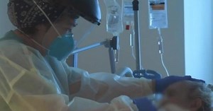 Record COVID-19 hospitalizations and infections continue to ravage health care system