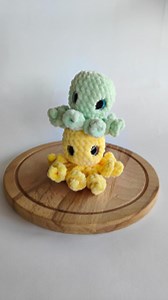 49K views · 810 reactions | Octos on repeat for my Mom's kindergarten class. Comment 'octopus' to get the links. Super quick and easy to make. #crochetoctopus #minioctopus #freepattern #octopusamigurumi #amigurumi #craftideas | Passionatecrafter | Facebook