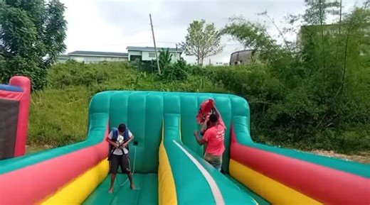 Pull… run… FLY! 💥😂 The Bungee Run inflatable was a crowd favourite, and we were proud to provide the fun at Bellefield High School’s Funtastic Sunday! #ItsAPartyJA #BungeeRun #WeProvideTheFun #SchoolFunDay | Its A Party Ltd