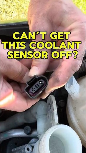 How to Unclip Coolant Sensor on Volkswagen Jetta Overflow Tank