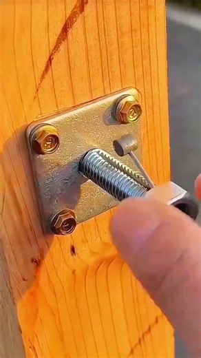 "Threaded rod tightened, structure secured with precise tension."