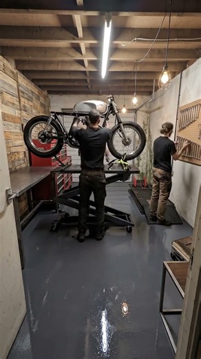The garage that had become a graveyard for junk... AI turned it into a custom motorcycle workshop.
