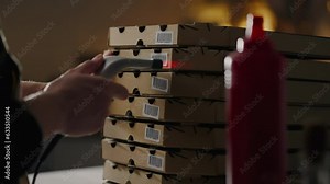 Mozzarella Cooking Staff Professionally Scanning Barcode with Electronic Scanner in Bakery Shop. Assistant cook Serves customers in a fast food restaurant, street eatery