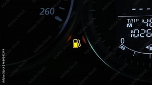 Empty fuel warning light in car dashboard. Fuel pump icon. gasoline gauge dash board in car with digital warning sign of run out of fuel turn on. Low level of fuel show on speedometer dashboard.