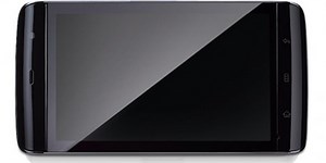 Table de Dell, con teléfono y cámara