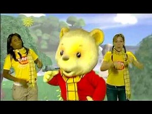 Rupert Bear, Kemi Majeks and Naomi Wilkinson do the Rupert Milkshake Dance