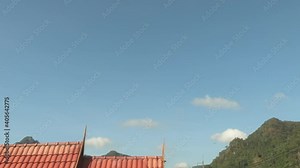 blue sky with altostratus clouds line across the sky from left to right in horizontal. pink clouds and space at the middle of the screen. sunset sunrise skyline colorful sunlight, nature background.