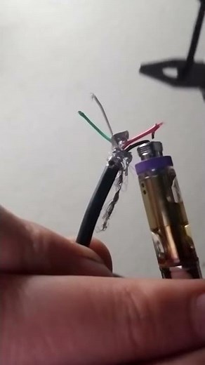 Hot wire vape pen with phone cord