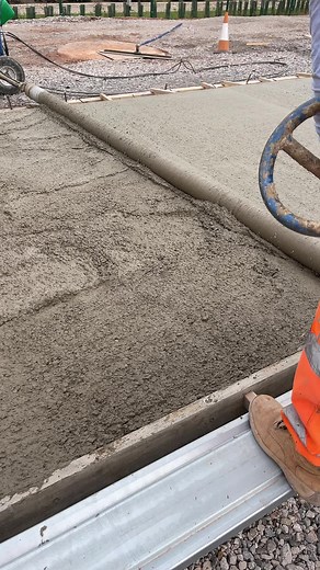 Concrete Smoothing Techniques by a Construction Worker