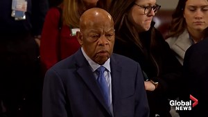 Civil rights leader John Lewis pays his respects to President George H.W. Bush
