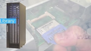 Installing the electronics tray in the Diamondback tape library