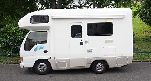 Tiny Isuzu Elf Camper RV Is a Tight World Solution to Travel