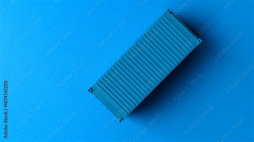 A cargo container in a port warehouse as a logistics element, export, and transportation from the docks. A cargo container as a background for your design