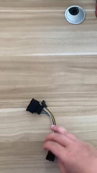 What are the adaptors and harness in the box 