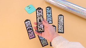 8.6K views · 198 reactions | DIY Christmas Bookmarks with HTVRONT Holographic Sparkle Adhesive Vinyl. Materialshttps://bit.ly/3P6sPIn #htvront #bookmarks #Christmasdecor #Christmascrafts #cricut #cricutcrafts #handmade #asmr #silhouettecameo #craftvideo #gifts | HTVRONT | Facebook