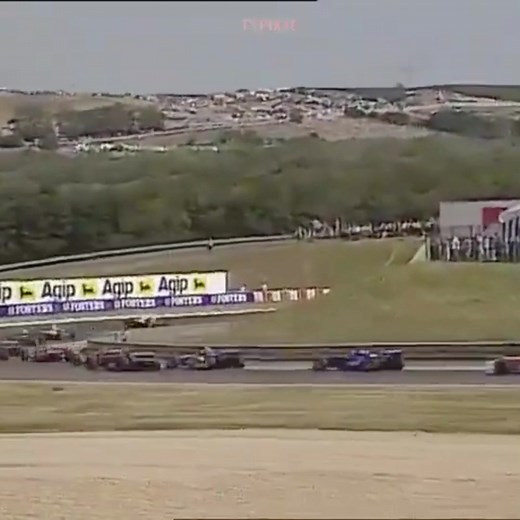 A perfect storm of steel and speed. Don't miss the Turn 1 scramble! 🌪️ ​ ​The 1995 Hungarian Grand Prix Race Start: A truly iconic visual as the F1 field compresses towards the tricky Hungaroring Turn 1. ​This is where the race can be won or lost in the first five seconds. Pure, high-stakes action from the moment the lights go out. ​Look closely: Who narrowly avoids contact in the first corner? Comment what you see! ​#F1Scramble #TurnOne #HungarianGP1995 #RaceAction #MotorsportVisuals #HighStak