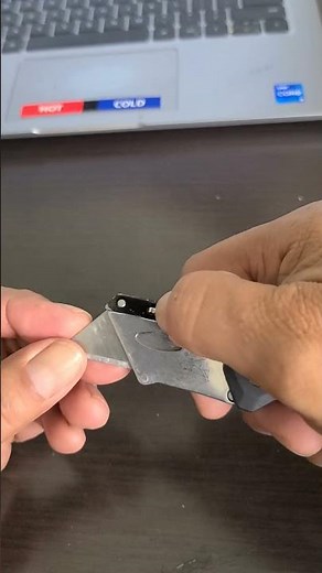 change out blade on Husky utility knife