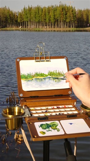fuumuui official on Instagram: "Pick it up anytime, anywhere, and begin your watercolor journey. The travel painting palette set includes: drawing board, paint box (magnetic attachment), divided palette, double-ended brushes (different sizes), pencil, water buckets (two, for water and brush cleaning), shoulder strap, carrying strap, clips, and storage bag. 🎨 Travel Palette Set: Portable 24-Well Watercolor Palette Set | Includes Travel Brush & Multi-Use Straps, Perfect for Outdoor Painting Paper