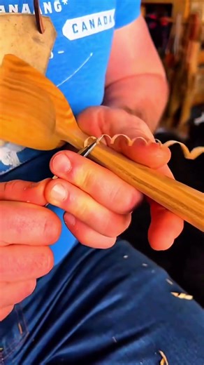 Shaping wooden spoons carving intricate patterns using sharp tools and sanding surfaces smooth