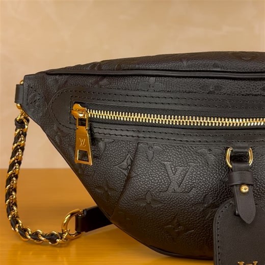 Valerie Drachova on Instagram: "High Rise PM $2430  The iconic High Rise bumbag is reimagined this season in black empreinte leather. Just like the original, this PM edition features an adjustable strap, front and back zipper. Strap is adorned with partial braided chain. Measures 12.2 x 5.9 x 2.4 inches. Bonus: side by side with regular High Rise AND mod shot on a male model ( courtesy of @justin_elig ☺️)"