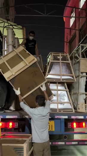 The custom-made furniture has been completed and packed for shipment.