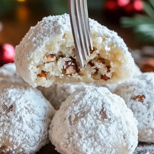 Pecan Snowball Cookies Ingredients: • 1 cup butter, softened • ½ cup powdered sugar • 1 tsp vanilla extract • 2¼ cups all-purpose flour • ¾ cup finely chopped pecans • Extra powdered sugar for rolling Directions: 1. Mix everything until a soft dough forms. 2. Roll the dough into 1-inch balls and bake at 400°F for 13–15 minutes. 3. Allow the cookies to cool slightly, then roll them in powdered sugar (roll again when fully cooled). Preparation Time: 20 minutes | Cooking Time: 15 minutes | Total Ti
