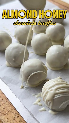 The Terrace Kitchen on Instagram: "Healthier White Chocolate 🍫 Truffles Recipe 👇🏻 Indulge in these luxurious almond, walnut & cashew truffles sweetened with pure honey 🍯, infused with aromatic green cardamom 🌿, and coated in creamy white chocolate 🤍. Finished with a touch of edible gold leaf ✨, they’re a healthier dessert that feels like pure bliss! 🍫 INGREDIENTS - 1/2 Cup Almonds - 1/4 Cup Walnuts - 2 Tbsp Cashew Nuts - A pinch of Salt - 2 Tbsp Milk Powder - 2-3 Pinch Cardamom Powder - 2