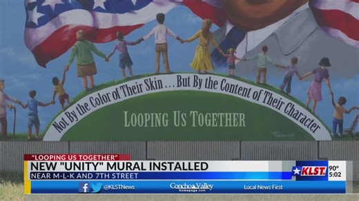 MLK mural installed on Loop 306 wall