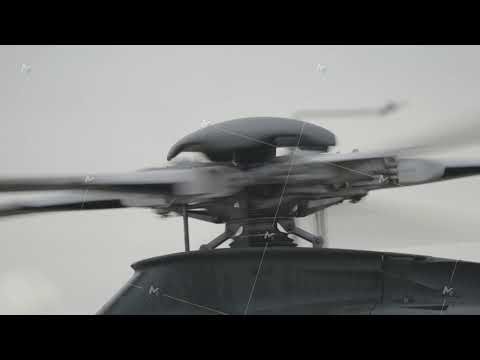 Helicopter main rotor spinning close up