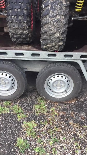 Showcasing Rugged ATV Loaded on Trailer