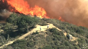 Homes ablaze in Orange County bush fire