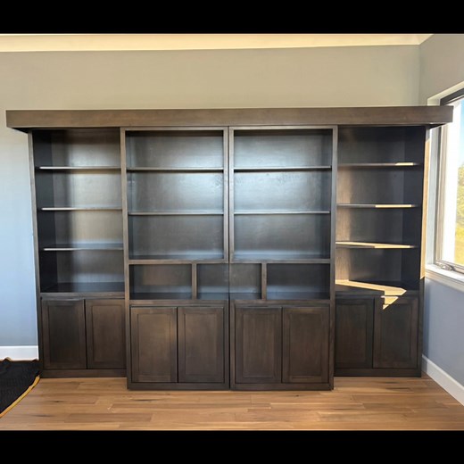 Watch This Wall Bed Transform 🛏📚 From bookshelf to bedroom in seconds—this custom Shaker Queen Sliding Library Murphy Bed Group is the ultimate space-saving solution. ✔️ Sliding bookcase front ✔️ Built-in nightstand bookcases ✔️ Side cabinets with Shaker doors adjustable shelves ✔️ 1½” thick bed sides for strength and style ✔️ Shown in rich Custom Espresso on Maple 📐 136”w x 92”h x 28”d overall 📍 Crafted locally in Largo, Florida Whether you're upgrading a guest room or designing a multifunc