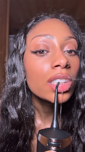 Alkaline With Adina on Instagram: "Comment “I’m Flossing” for the 🔗 to the water flosser I use and my routine in the Glow Up Guide! Water flossing ✨ is one of those glow-up habits nobody talks about enough. I personally have permanent retainers and adding a water glosser to my routine has been a game changer! Here’s the truth: 💧 It reaches deep under the gumline where traditional floss can’t 💧 It removes leftover food + loose plaque right after meals 💧 It helps reduce inflammation, bleeding 