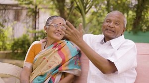 clip-1089448911-laughing-senior-couple-while-talking-each-other