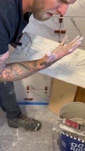 Some people swear by back troweling and others swear by combing the walls and back buttering the tile. We do both, each in their own scenario. Also, some will ridicule me for calling this “backbuttering” when in actuality it’s “back troweling”, and to them I say, “ok, so what? I called it the wrong thing” 😂😂 The fact of the matter is, I’m just trying to teach your helper how to do it without making a huge mess… Ps. Follow @rocksteadytoolco #tile #tilework | Rock Steady Tile Co.