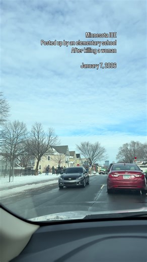 ICE agents point guns out their windows at crowd gathering, as they reverse and flee after shooting an ICE observer in the face through the windshield of her suv