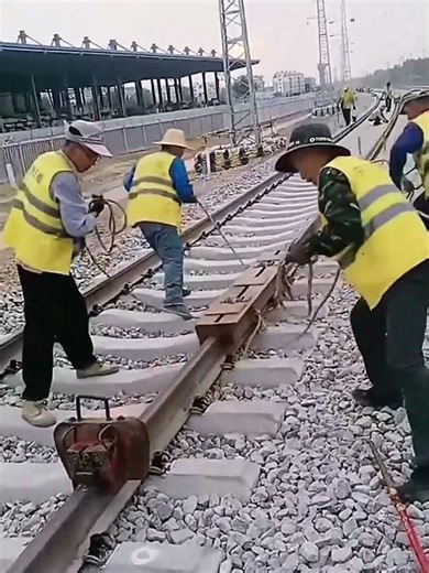 Adjusting process of railway track components using impact tools