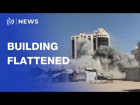 “Israel” levels residential building in Gaza City