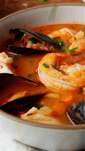This authentic Cioppino recipe comes straight from my years as a professional chef-fresh fish and seafood simmered in a fragrant tomato-wine broth. A San Francisco classic that's surprisingly simple to recreate at home! Festive and elegant, this makes a great meal to serve at a New Years Eve dinner party. Type “save” to get the recipe! Go to the recipe on the blog: https://www.feastingathome.com/cioppino-recipe/ Follow @feastingathome for a steady stream of healthy and delicious recipes like thi