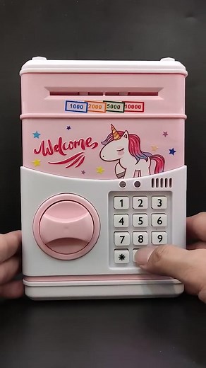✨ Teach your kids the joy of saving with the ATM Piggy Bank! This password-protected mini safe makes saving fun & secure. Insert cash, enter your code, and keep your savings safe!  Perfect gift for little savers! Shop now! | Journey To The ChildLand | Facebook