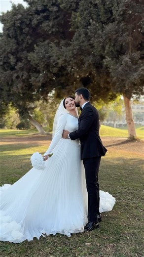 Seven Snaps on Instagram: "One look was enough to tell a lifetime story✨ Wedding content creator : @seven.snaps Wedding planner: @eleven11planning_bysohilaabbas Makeup: @shimaagama1 Dress: @samahmahrancouture @asmaa_elsharnooby Bride accessories: @alaaakram_roses Prewedding outfit: @hebaelmasrycouture Photography: @ayman_elkayal_official Videography: @yehia.films Venue: @hilton_pyramids_golf Congratulations to fabulous couple @salma_nabill 🥂 @islamkhalid"