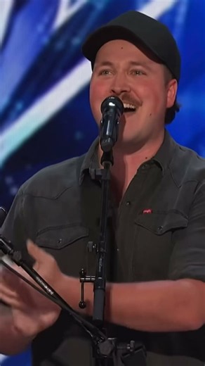 the AGT stage with a feel-good performance of “Take Me Home, Country Roads” by John Denver #agt