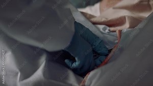 The Umbilical Cord Cutting by a Midwife at Childbirth