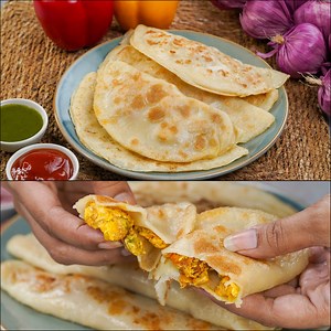 Looking for a quick and healthy breakfast idea? Try this Egg Paratha Recipe that’s so delicious, you’ll be surprised with every bite! #EggParatha #BreakfastRecipe #ParathaRecipe #EasyRecipes | N'Oven Foods