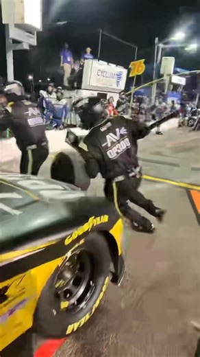 NASCAR Pit Crew Life on Instagram: "Jump in front of a moving car, hang two tires, and make adjustments? The life of a tire carrier."