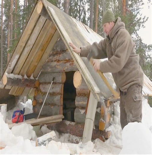 A year's worth of log cabin building, working off grid, and escaping civilization is captured in this full video. | SOLO Boys